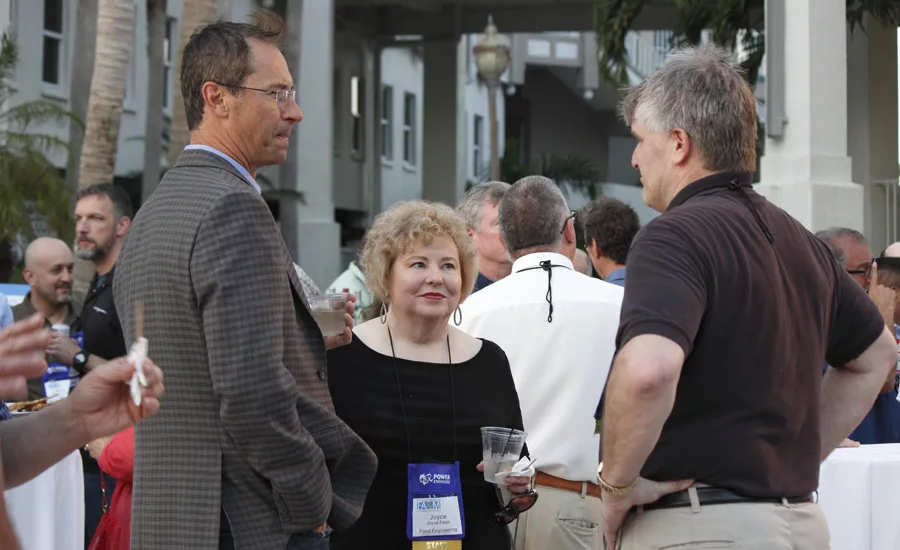 Joyce-Fassl-with-industry-professionals-at-FA&M