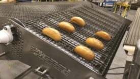 image of rejected bakery dough discharging from a conveyor