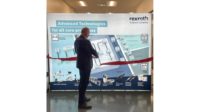 Man in front of Bosch Rexroth building plans