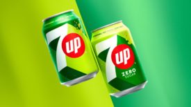 Two of the new 7UP cans next to each other, showcasing the color changes and logo changes of the brand