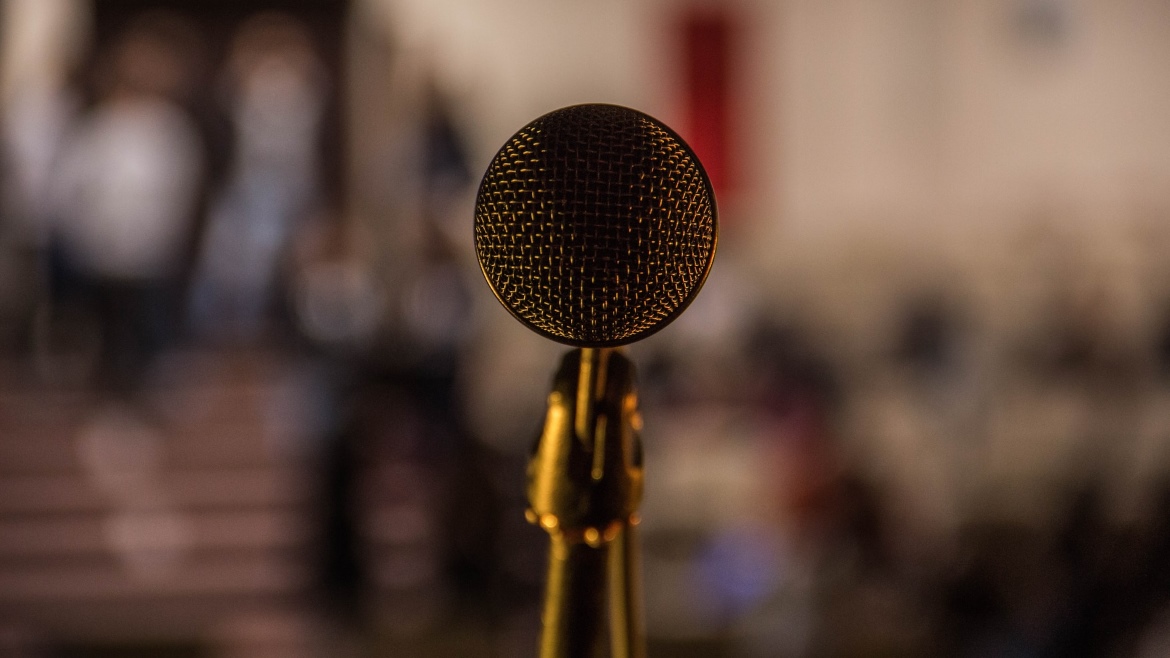 A microphone with the background blurred.