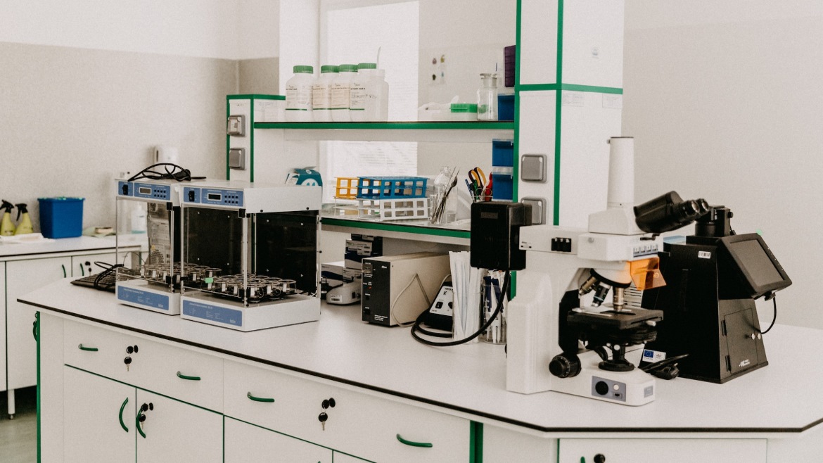 a laboratory counter with scientific instruments on top of it.t.