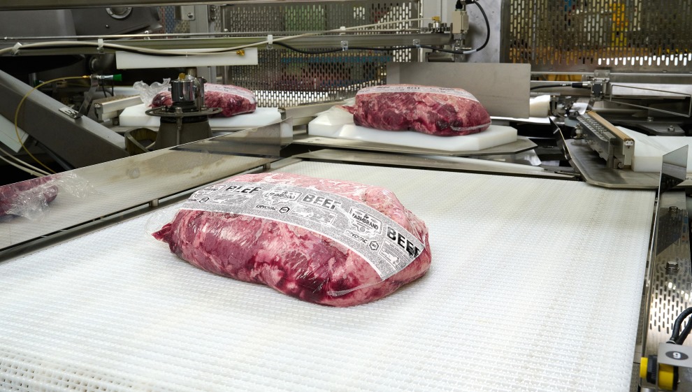 Meat on a packaging assembly line