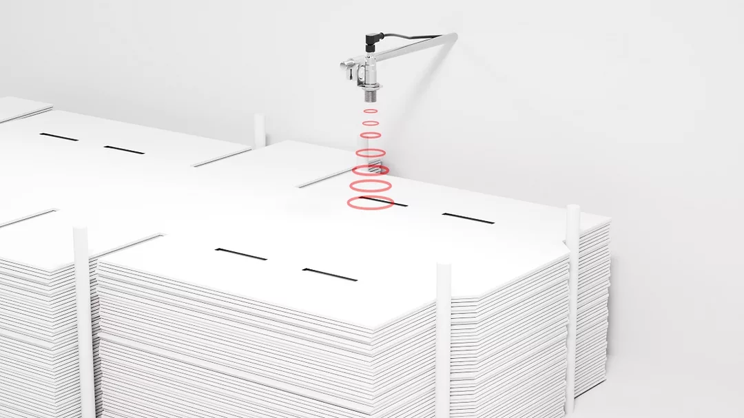 Sensor working on cardboard surface