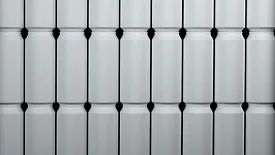White aluminum cans stacked next to and on top of each other