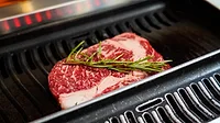 image of beef on a grill image of beef on a grill