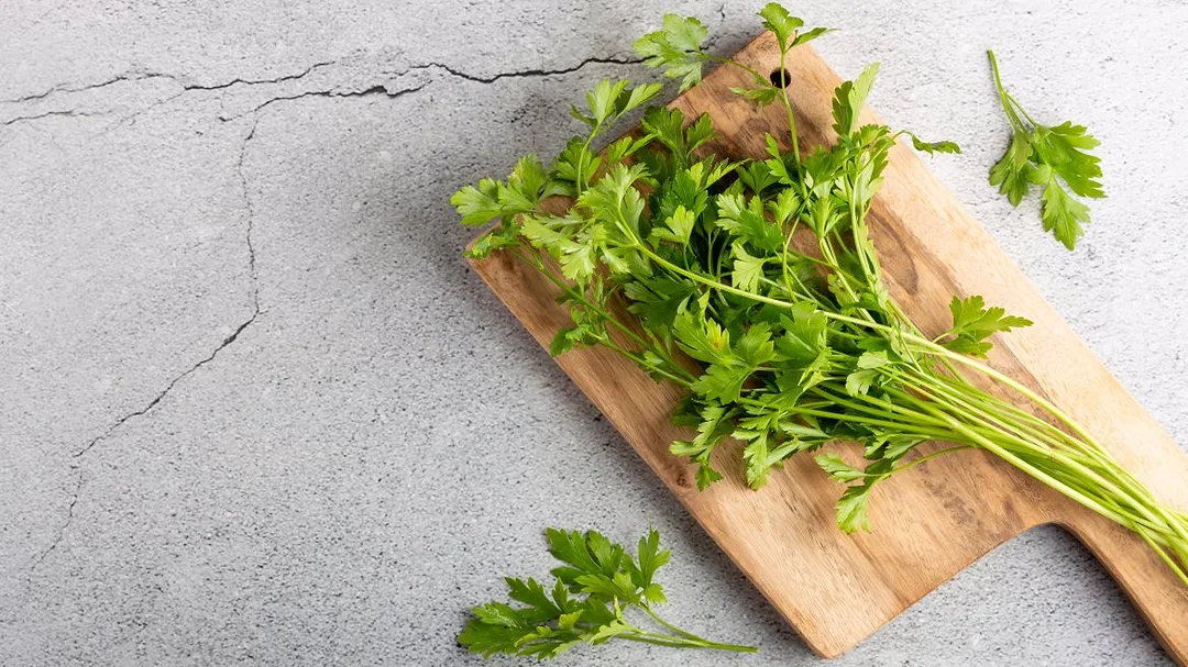 Dried parsley on a cutting board