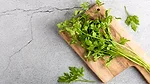 Dried parsley on a cutting board