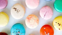 The top view of various macarons in different colors The top view of various macarons in different colors