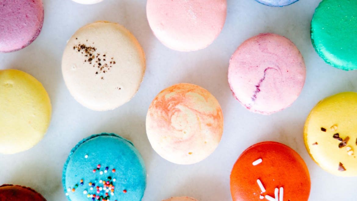 The top view of various macarons in different colors
