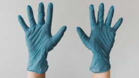 Hands with gloves on