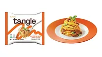 Image of Tangle's single-serve packaging with its brand logo, next to a plate of pasta Image of Tangle's single-serve packaging with its brand logo, next to a plate of pasta