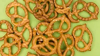 Pretzels laying on a green background Pretzels laying on a green background