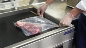 Sous vide cooking is a method in which foods are thermally processed in vacuum packaging at lower temperatures