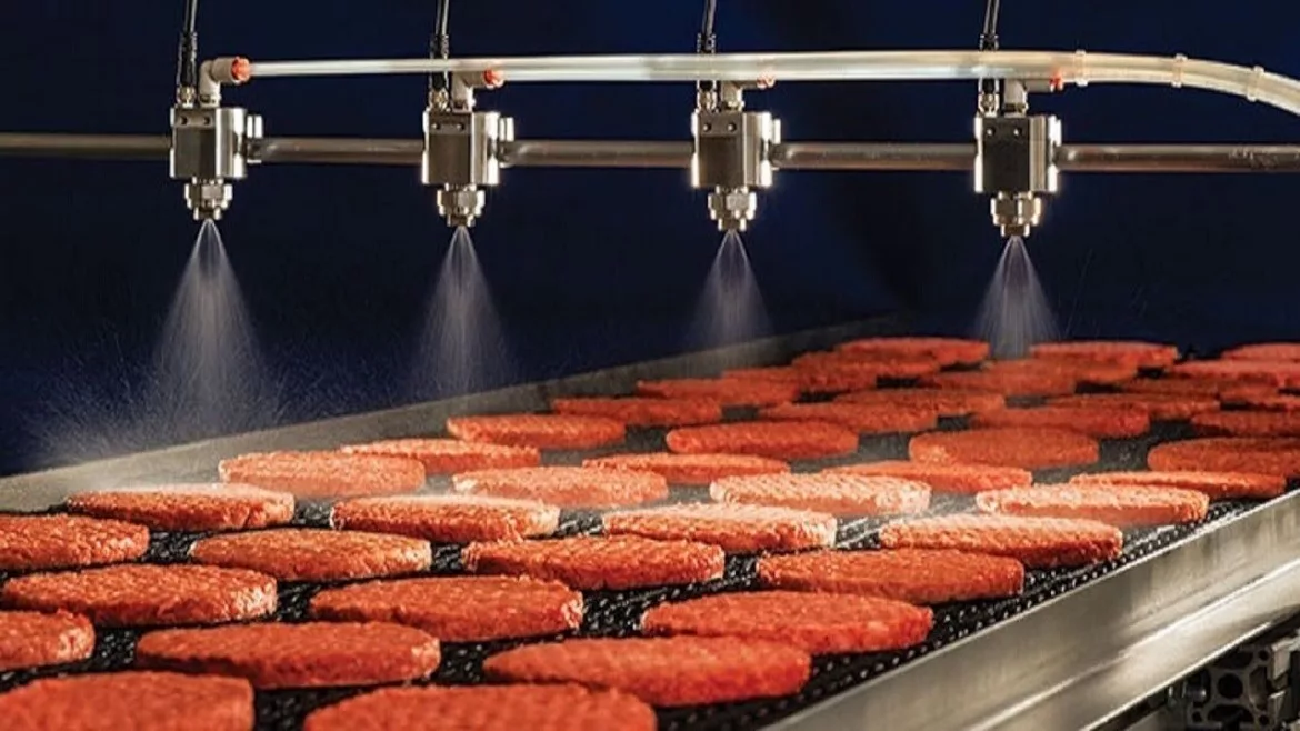 Patties on a conveyor