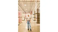 Fortress Technology Mennel Milling Person Standing in Warehouse Person Standing in Warehouse