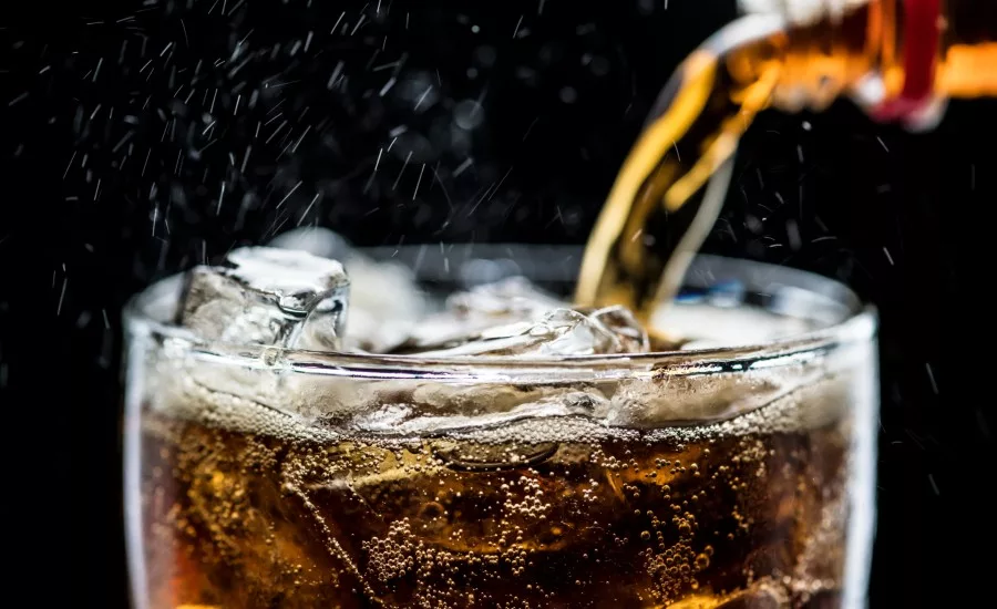 Carbonated soda poured into a glass