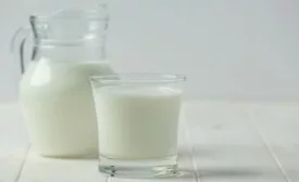 Milk in glass and pitcher