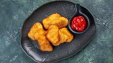 Chicken nuggets with ketchup