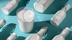 Milk bottles and cup Milk bottles and cup