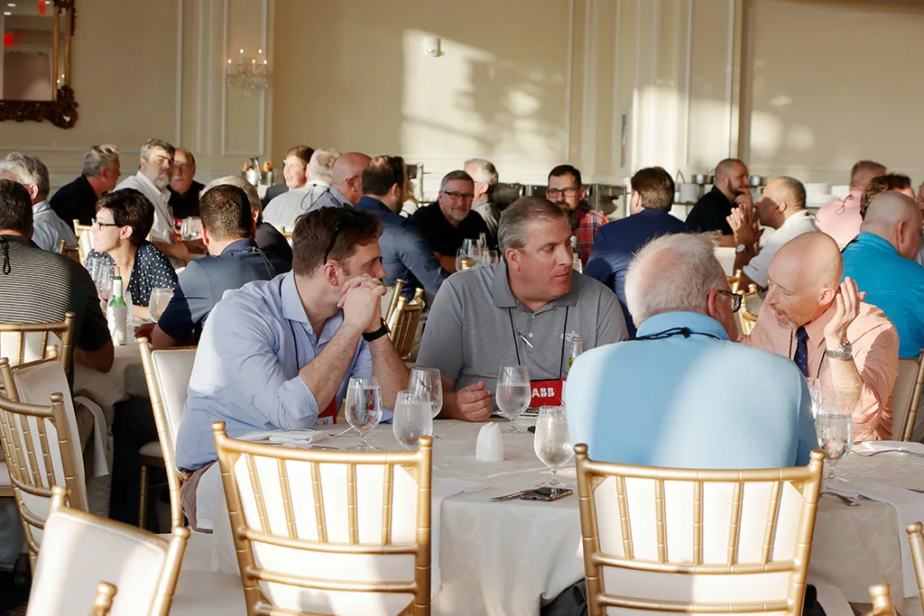 Food Automation & Manufacturing Symposium and Expo attendees networking in a ballroom at the Doral Resort in Miami.