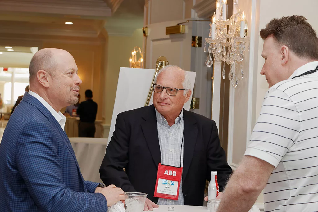 Food Automation & Manufacturing Symposium and Expo attendees sitting in an educational session classroom facing the presenter at the Doral Resort in Miami.