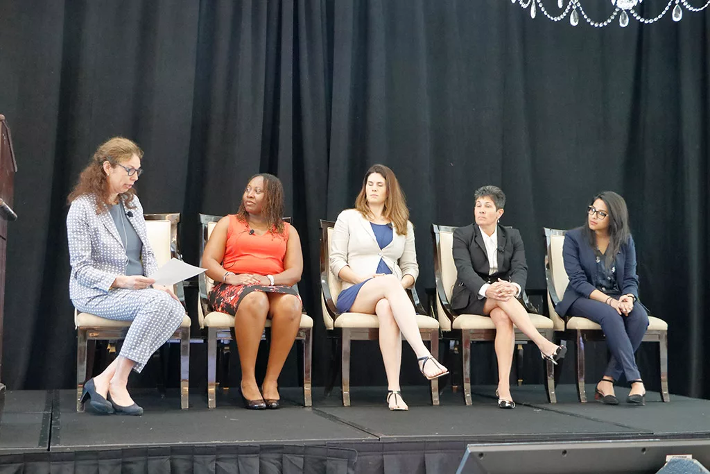 Food Automation & Manufacturing Symposium and Expo's 2019 panel with five speakers on stage.