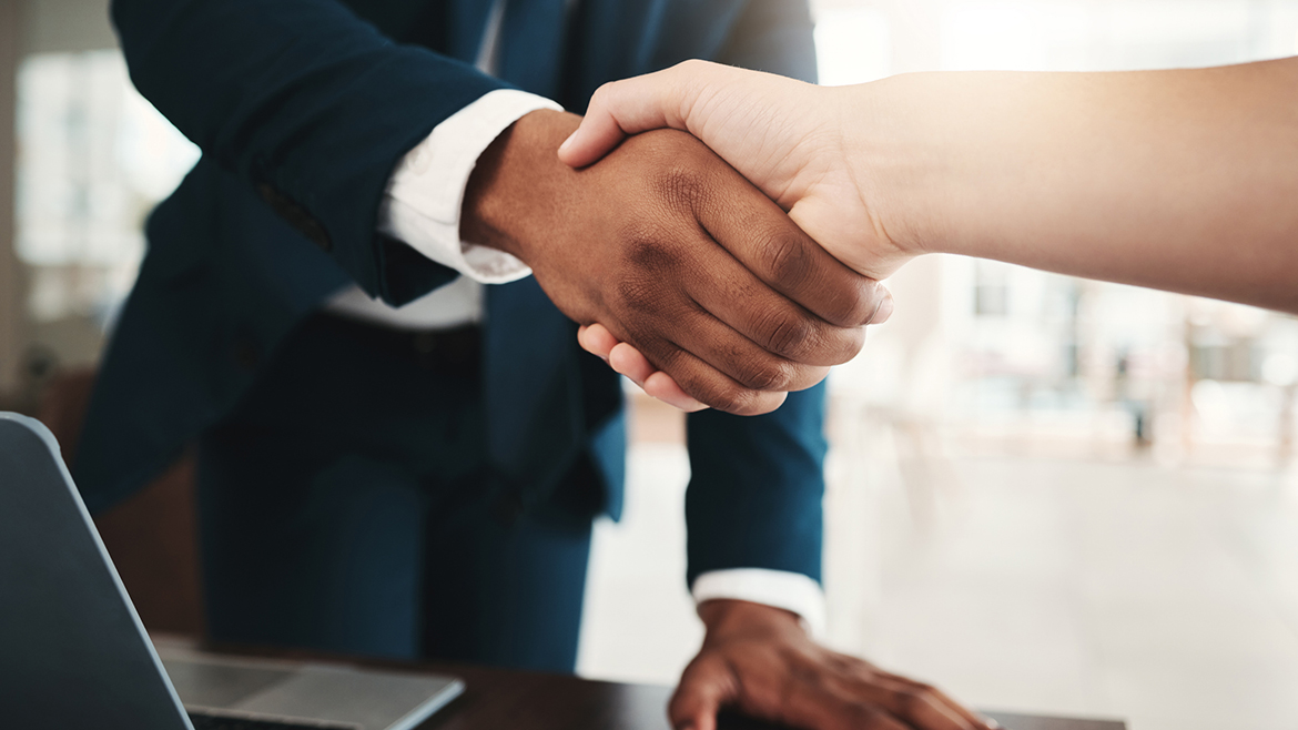 Close-up of a diverse business handshake.