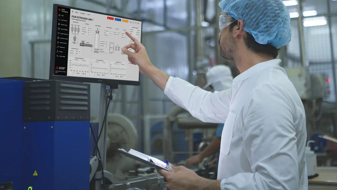 Operator checks machine data.
