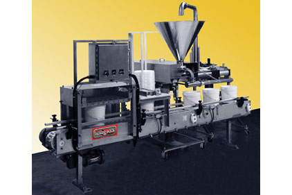 The Hinds-Bock automatic filling and lidding system