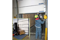 Ben and Jerry's maintenance staff replaced rigid bottom panels on its receiving dock doors with flexible FLEX-BACK panels