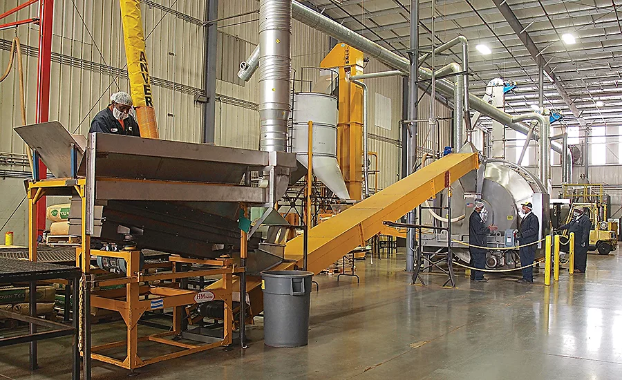 Tea conveyed to batch mixer