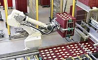 Robots used in industrial production line of bakery products