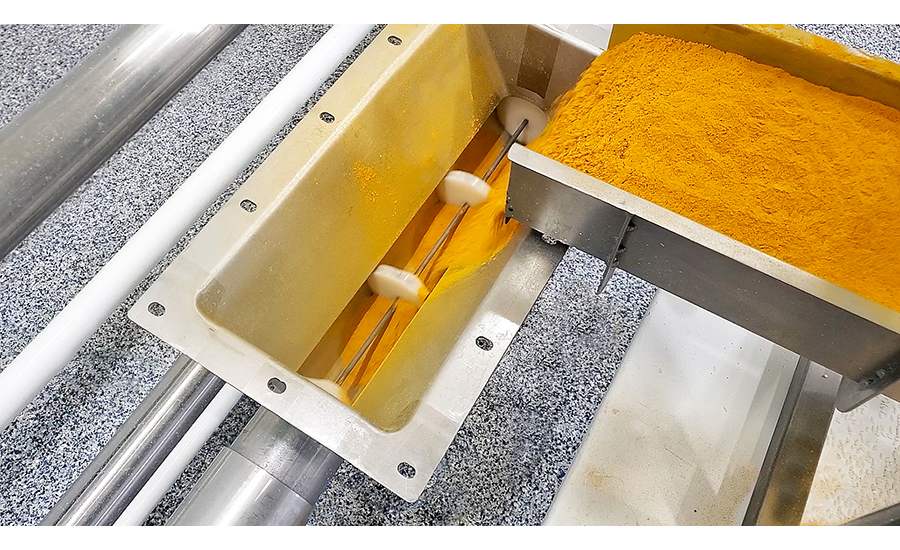 Conveying turmeric powder