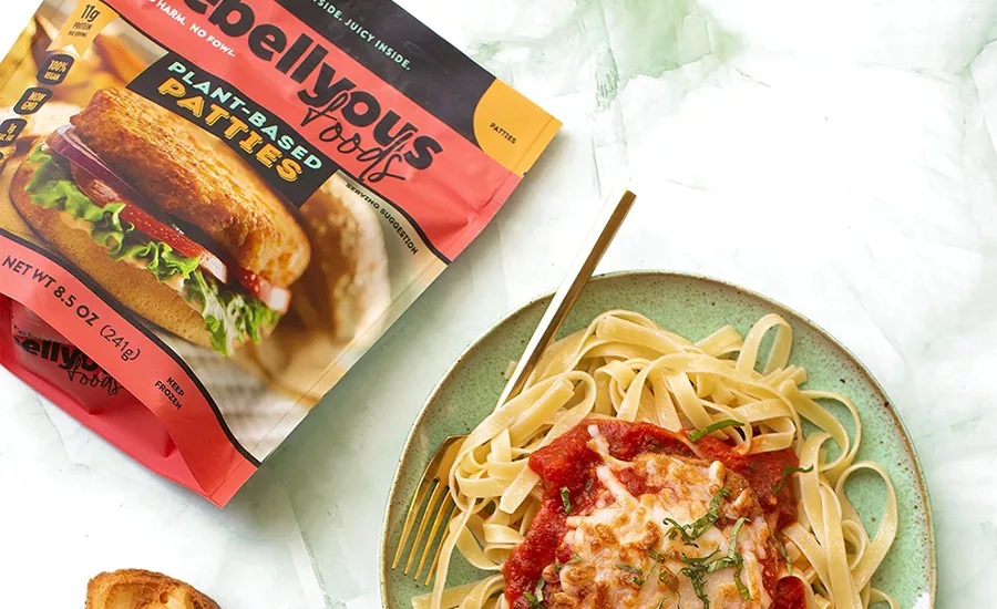 Two plates of Rebellyous Patties in a chicken parmesan dish 