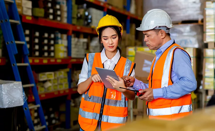 warehouse-worker-standing-by-storage-rack warehouse-worker-standing-by-storage-rack