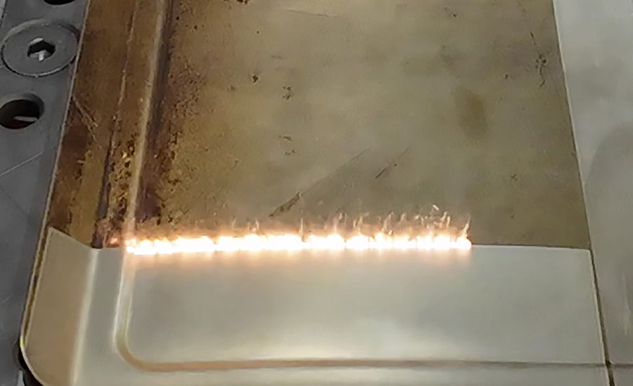 Laser ablation cleaning of a dirty baking sheet 