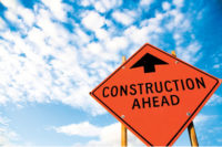 construction sign blue sky