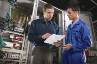 two men process control manufacturing