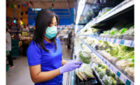 Woman mask shopping produce