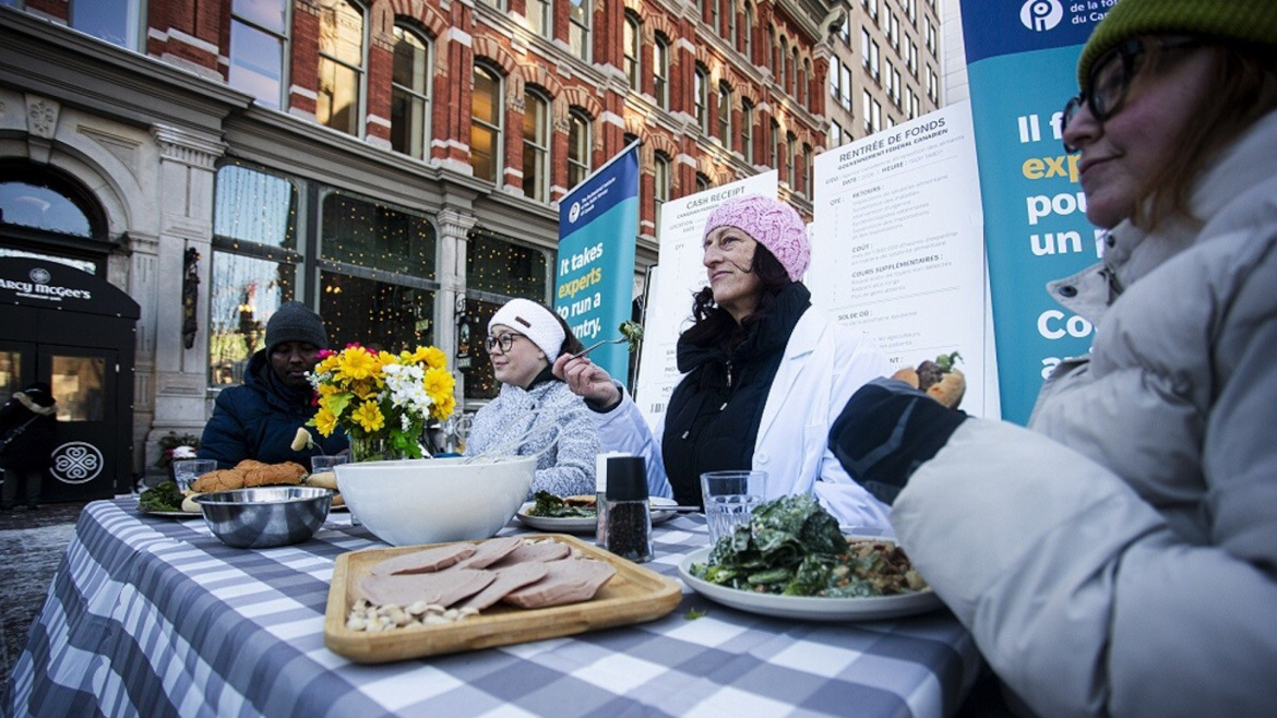 Food Safety professionals sitting at a table with frequently recalled foods.