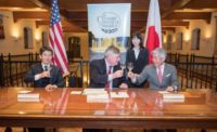 Dr. Tim Ryan, president of The Culinary Institute of America, shares a sake toast with Chairman Hiroshi Sakurai (right) and President Kazuhiro Sakurai of Asahi Shuzo to celebrate a new agreement between the CIA and the Japanese sake producer.